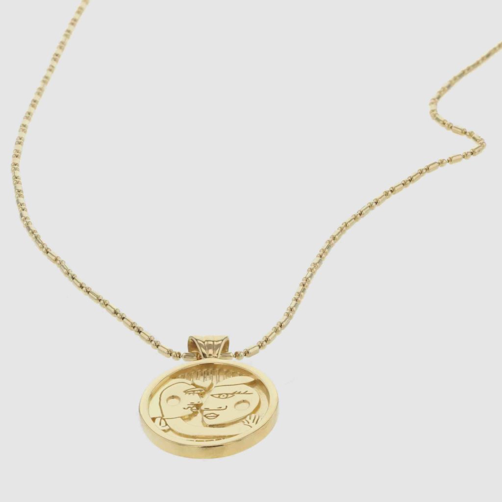 Lovers necklace gold from the Faces collection from Hasla. Norwegian Jewelry design.
