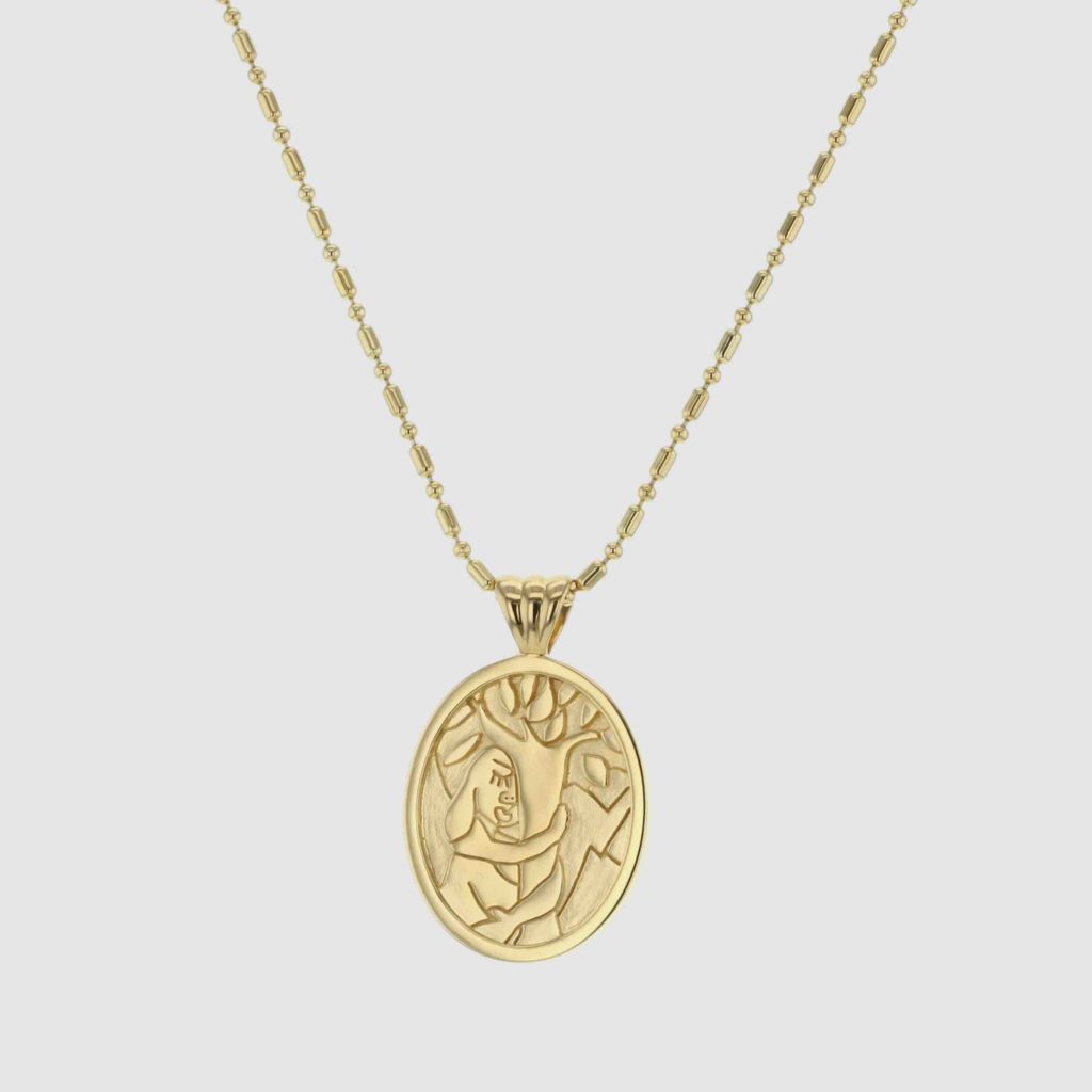 Hug A Tree necklace gold from the Faces collection from Hasla. Norwegian Jewelry design.