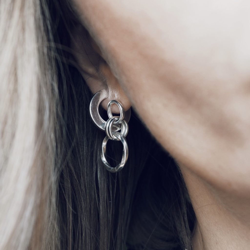 Persona earhoops silver from the Faces collection. Silver earrings from Hasla Jewelry. Norwegian jewelry design.